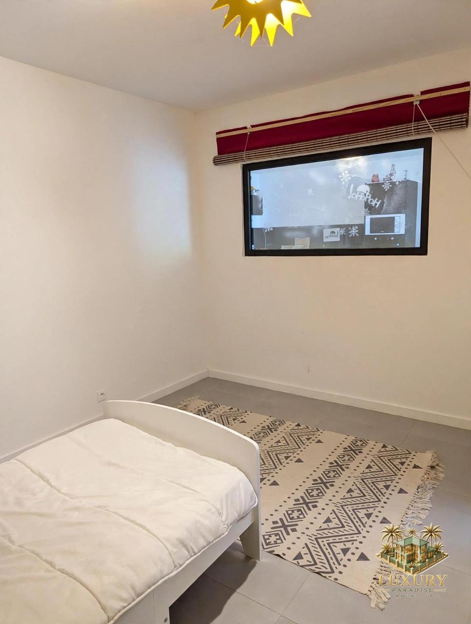 Cul-de-Sac – T3 rez-de-jardin avec jardin et petite vue mer